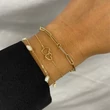 Kép 2/3 - Jackie Gold dupla szív arany karkötő - JKB23.049