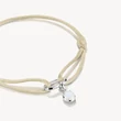 Kép 2/3 - Thomas Sabo bézs textilkarkötő ezüst nyitható láncszemmel - C1210-001-19