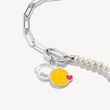 Kép 2/4 - Thomas Sabo Connect SMILEYWORLD® narancssárga, fejhallgatós emoji charm - CC1297-664-8